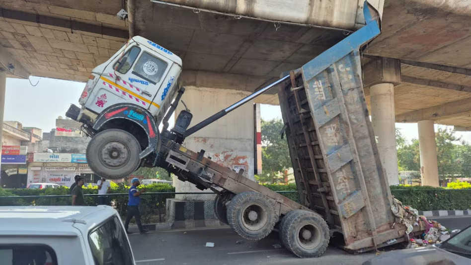 Municipal Corporation Dumper Hangs 15 Feet Above Road in Jaipur Near Miss